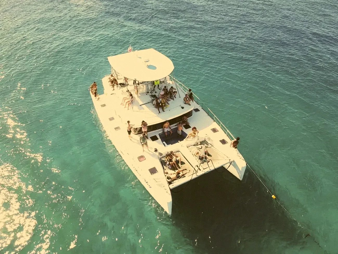 A group on a catamaran trip off the coast near Cabarete